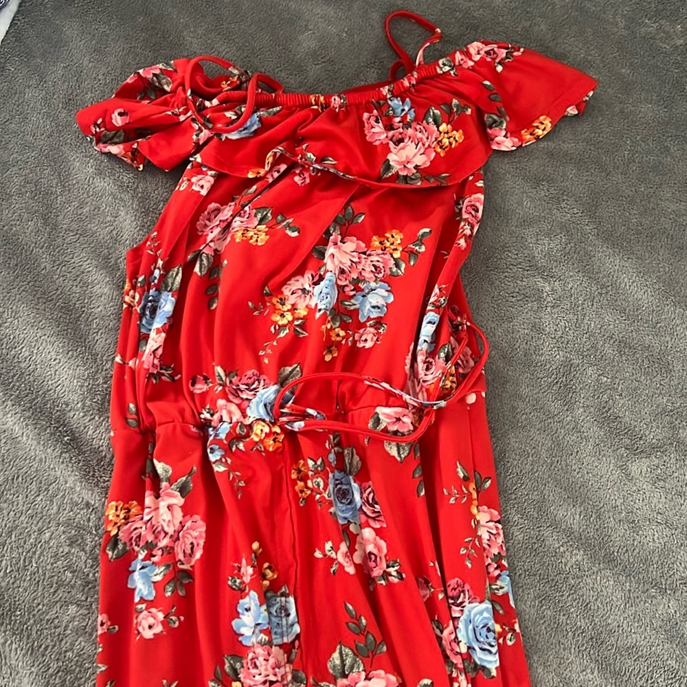 off the shoulder red dress with flower print.